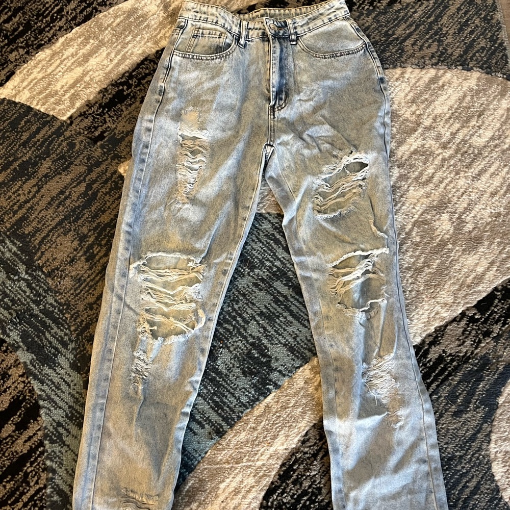 Distressed Light Blue Jeans